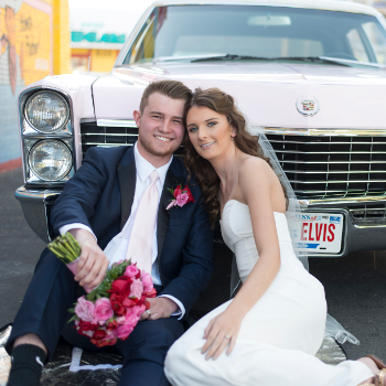 Traditional Las Vegas Wedding Couple Outside in Front of Pink Cadillac