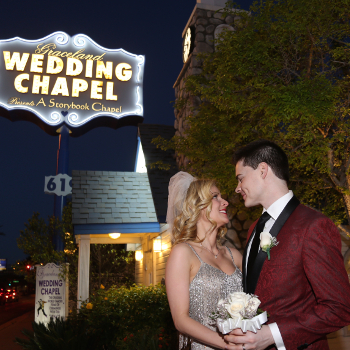 Traditional Las Vegas Wedding Couple Outside in Front of Graceland Storybook Chapel